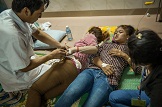 More Than 100 Workers Faint at Shenzhou Garment Factory